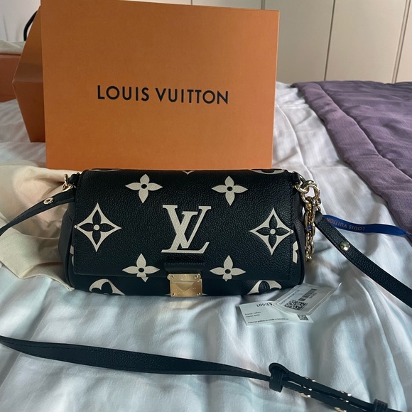 Louis Vuitton Favourite Bi-Color Monogram Empreinte Leather - Picture 9 of 14